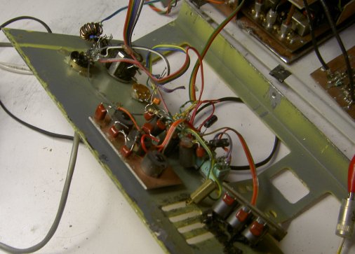 behind the front panel